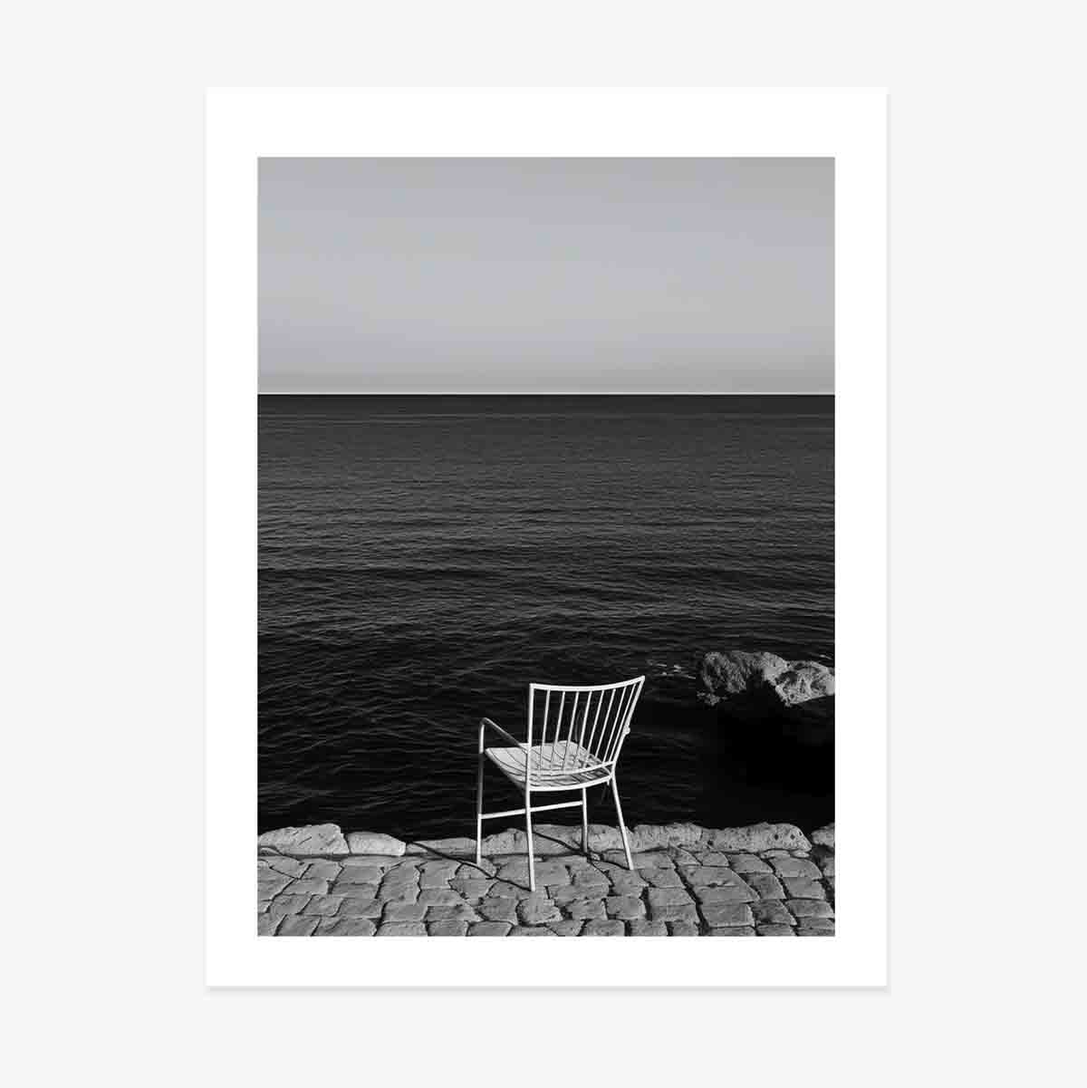 Poster Solitary chair by the sea